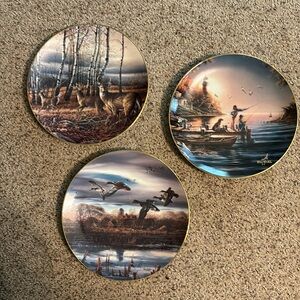 Terry Redlin Plates. 3 in set. Mounts inc.  like new. No flaws.